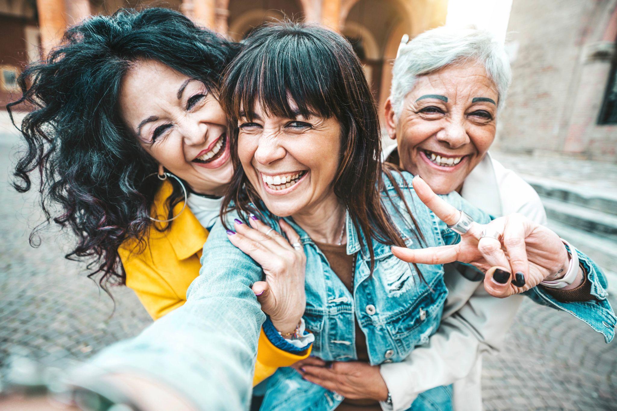 3 Gen x women taking a selfie