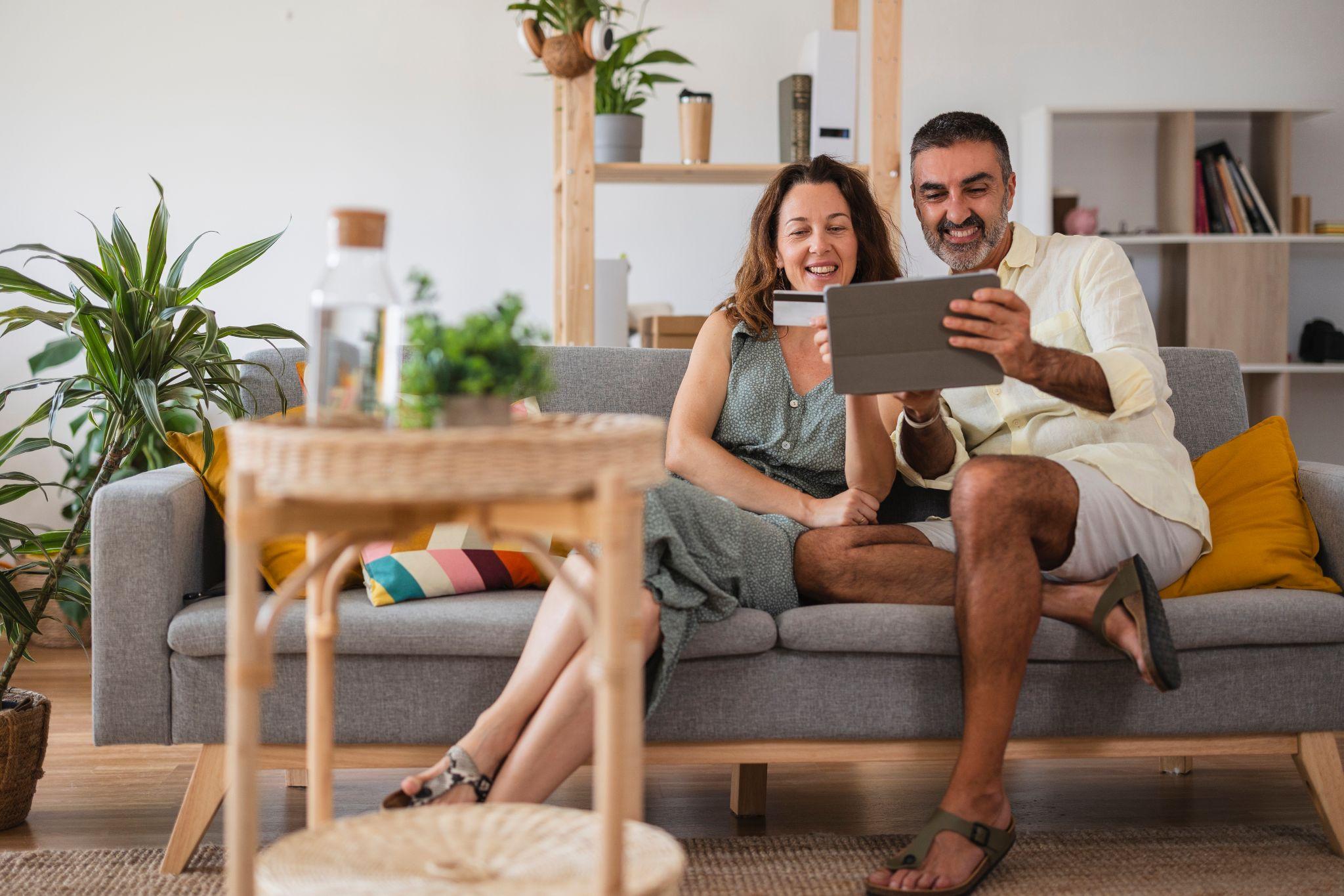 Generation x couple buying a product online