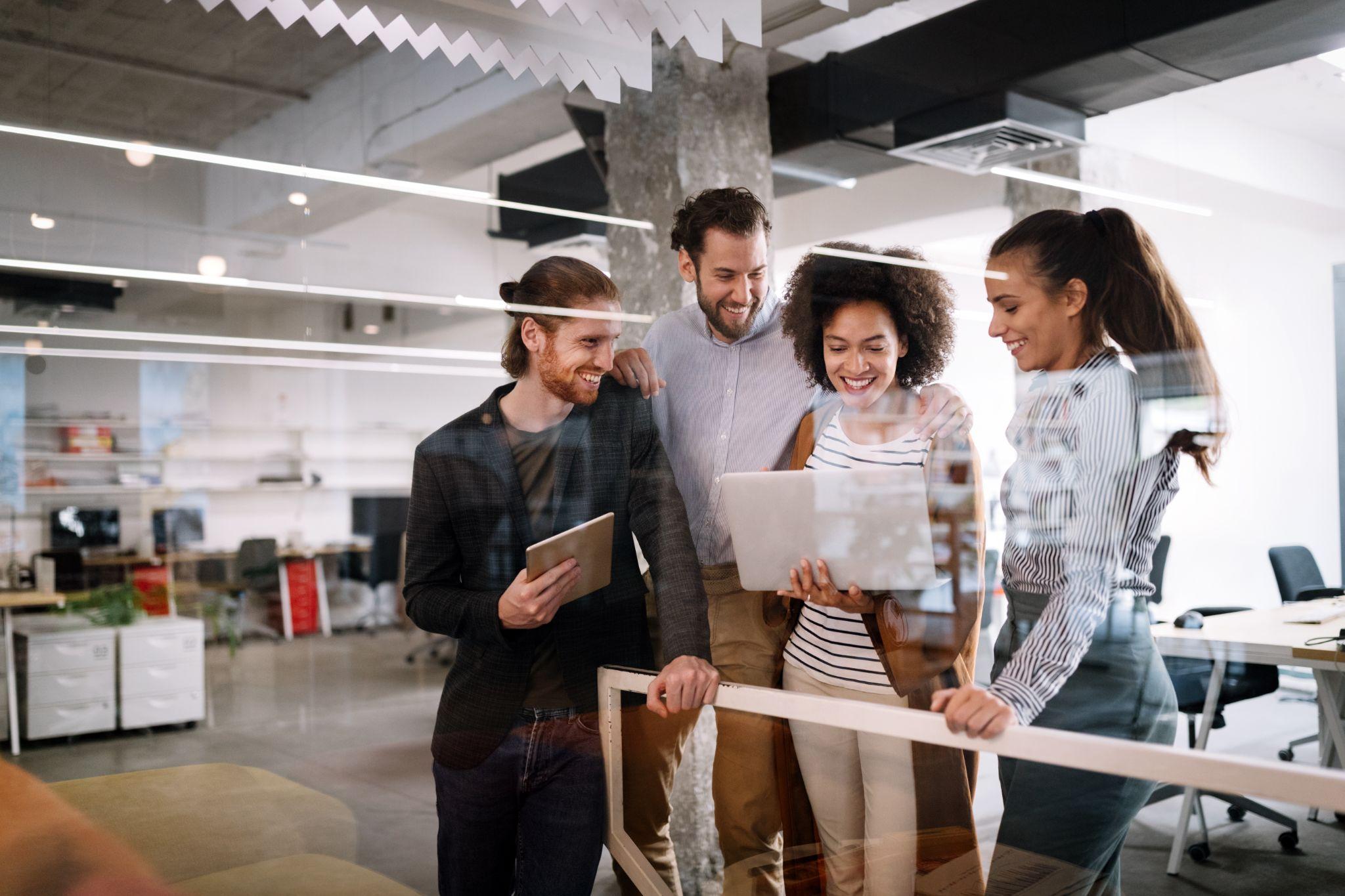 Employees working together on a marketing strategy
